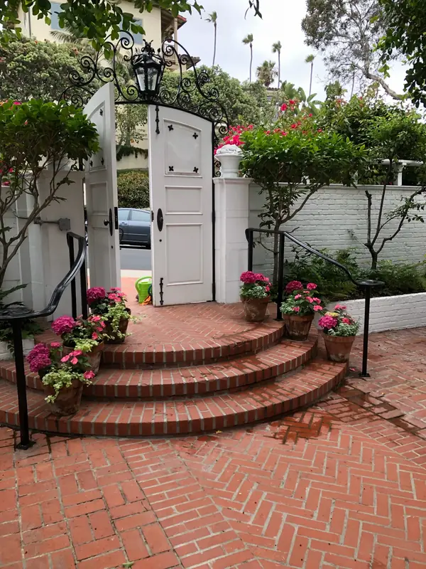 Brick stairs in La Jolla, relaid after tree roots cracked them