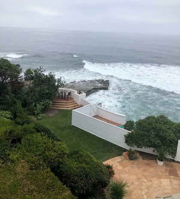 The garden from above, down to the brick terrace over the ocean