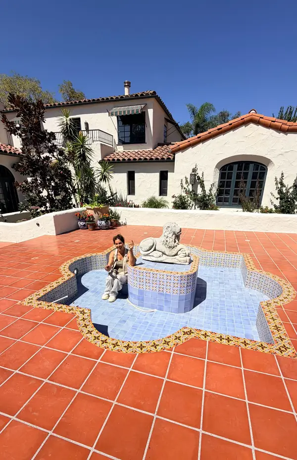 After: the fountain retiled in soft blue, with Talavera borders on the terracotta