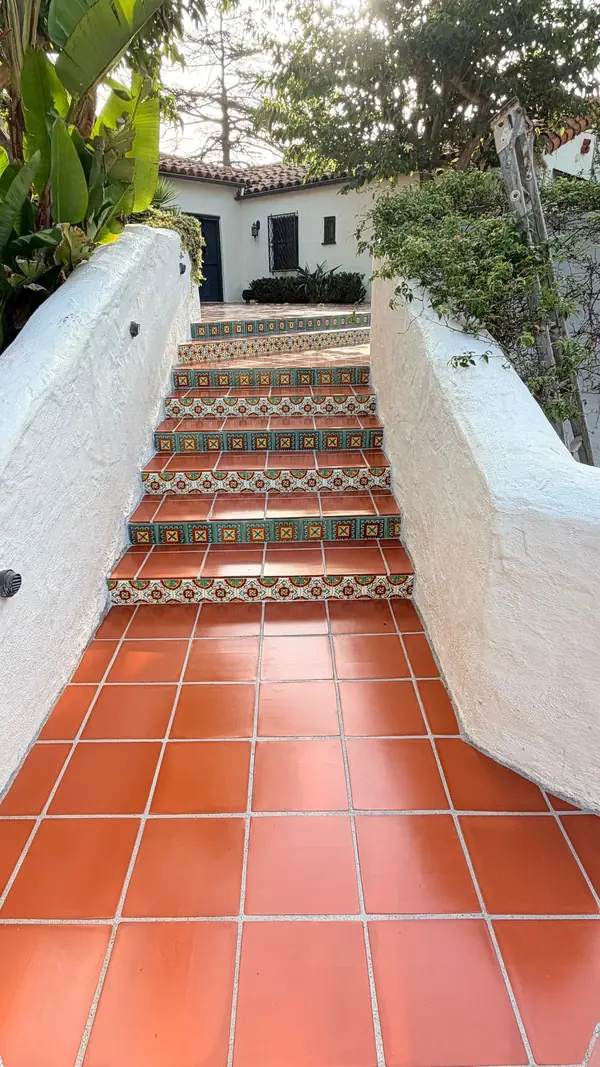 Saltillo stairs with patterned tile risers